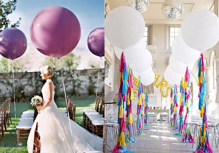 balloons decorate wedding aisle