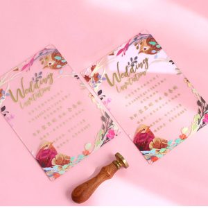 Clear laser-cut acrylic wedding invitation HPA291 featuring an elegant net pattern and two love birds illustration inside a translucent clear envelope