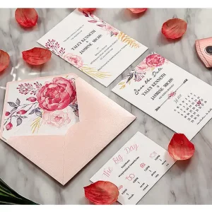 Blush pink pocket fold wedding invitation HPI295 displaying an ultra-thick 400g cardstock insert printed with watercolor cherry blossoms next to a pink envelope