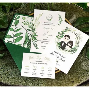 Deep forest green pocket wedding invitation folder HPI296 displaying a thick 400g cardstock insert printed with watercolor leaves and ferns next to a matching envelope