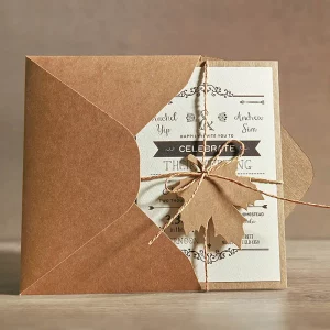 Vintage kraft brown paper pocket wedding invitation folder HPI306 displaying a thick 400g cardstock insert printed with rustic typography next to a matching envelope