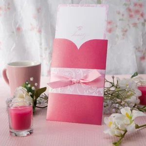 romantic blush pink pocket fold wedding invitation with curved heart flap and printed insert card