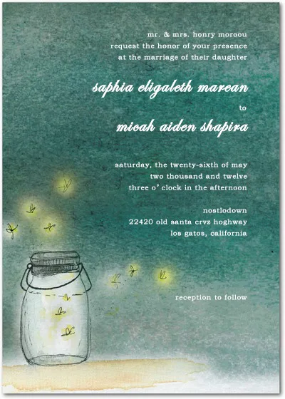 Rustic wedding invitation featuring a mason jar with glowing fireflies on a textured teal background with handwritten-style typography