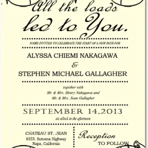 Vintage wedding invitation with black ornate floral scroll design and elegant script typography on a cream background