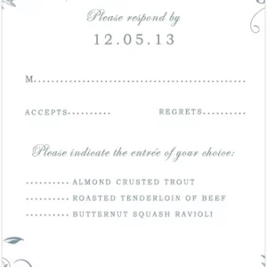 Dusty blue botanical wedding RSVP card with vintage floral frame, elegant script typography, and entrée selection options