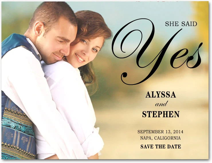 she said yes save the date card romantic photo engagement wedding announcement elegant script couple embrace soft tones